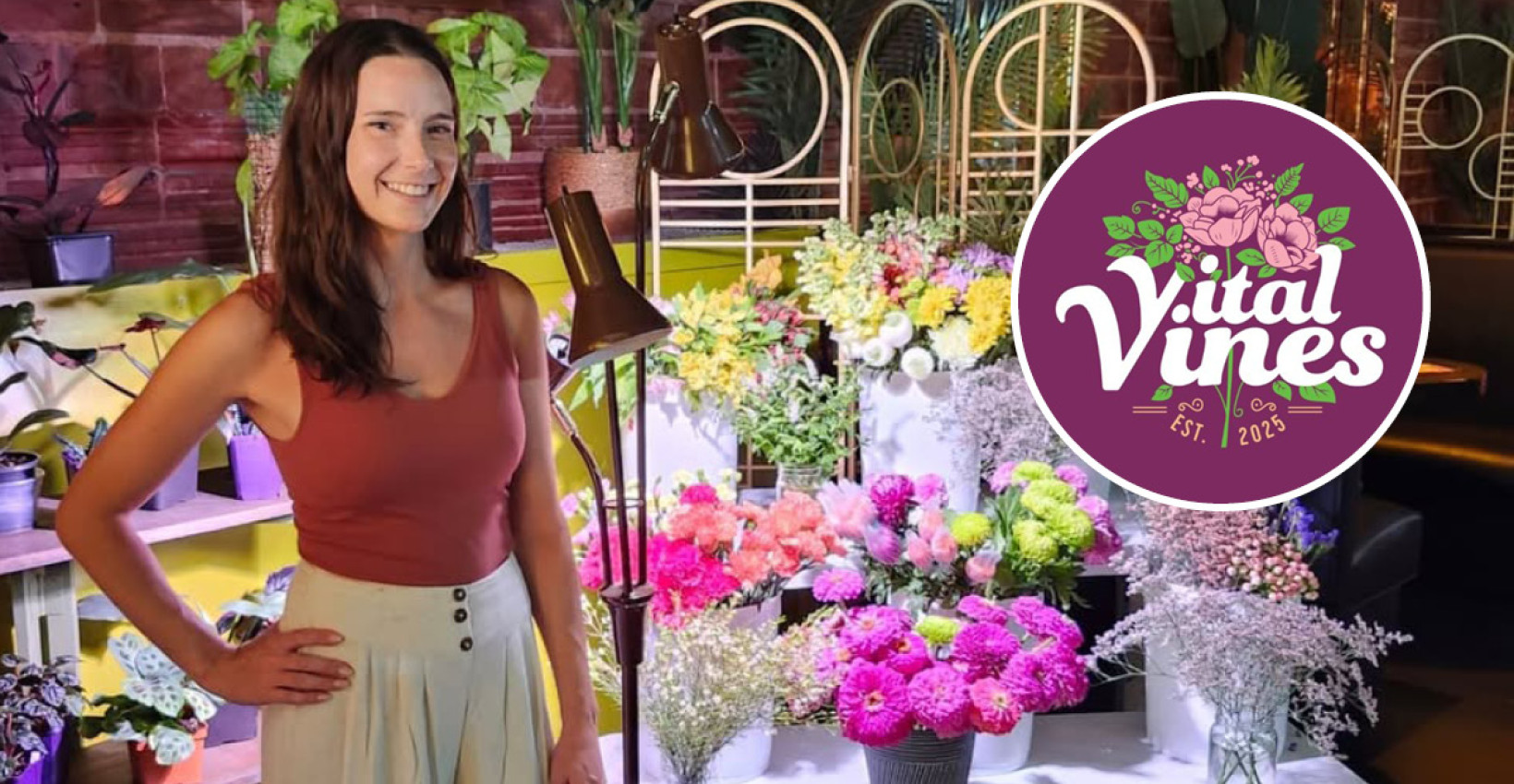 Sydney Vecchio stands in front of plants with the vital vines logo overlayed 