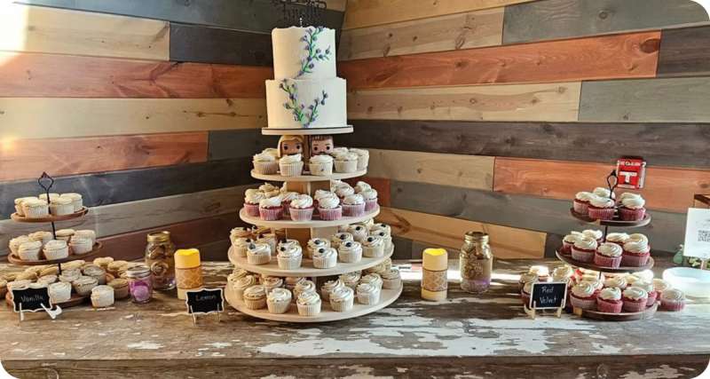 a table displaying cakes and desserts