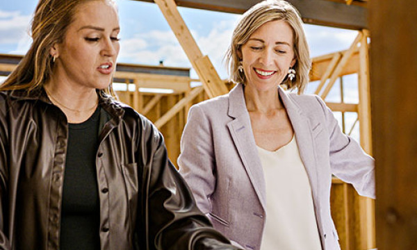 Woman walking through construction scene